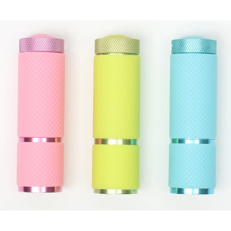 rubber coated glow in dark COB mini flashligh